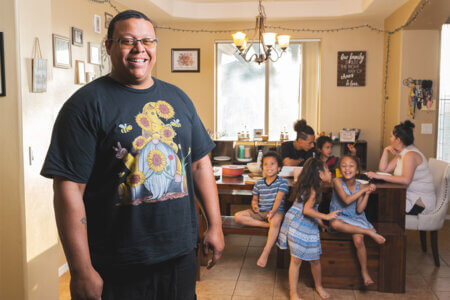 Aaron Chapman shares dinner with his wife and five children in Vali, Arizona.