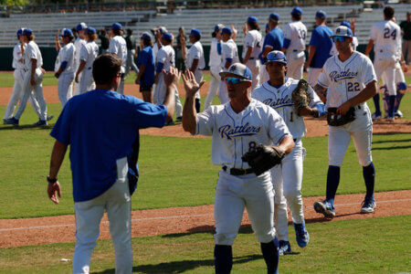 Baseball team congratulates members. The Rattlers also won the individual sport academic championships for 2022-23 in baseball and women's golf.