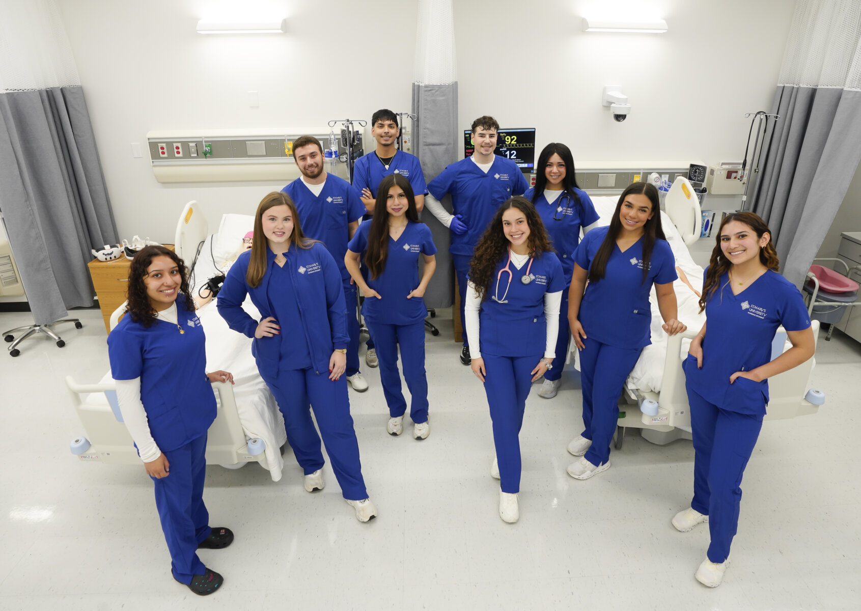 First group of nursing students take a group photo together.