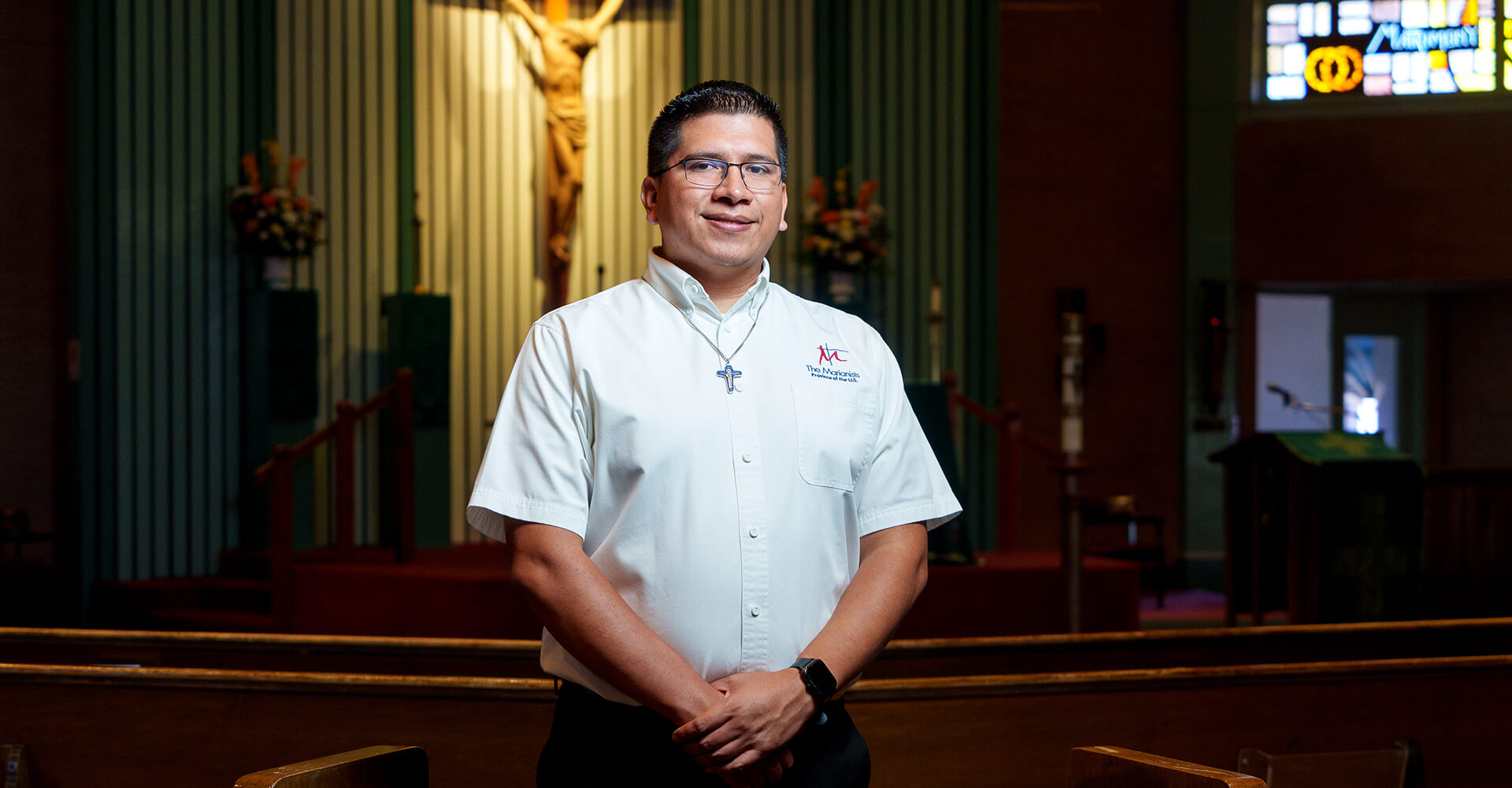 Guillermo “Memo” Peña Contreras poses inside a chapel sanctuary