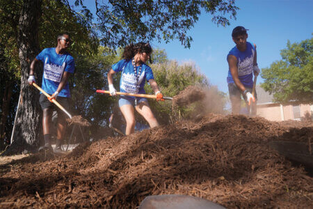 Students perform community service during Continuing the Heritage in August 2023.