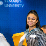 A young woman attends a career fair at St. Mary's University.