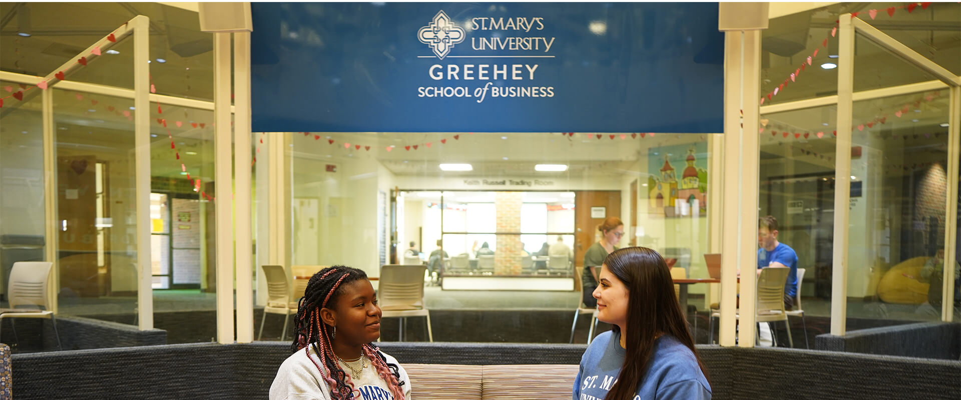 Dede Fioklou-Toulan and Belyn Thompson have their monthly meeting at the Greehey School of Business.