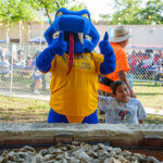 Rattler Man inspecting, and approving, an order of oysters at Fiesta Oyster Bake 2023.