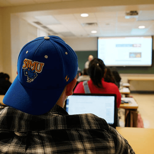 Student in a St. Mary's University hat sitting in class