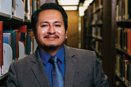 Christian Elguera Olórtegui visits the library at St. Mary's University.