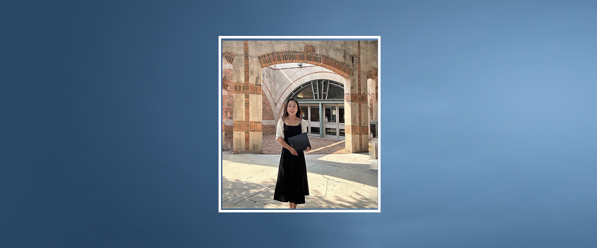 Yun Weixiao, Law Professor at Changchun Humanities Academy in China, is a Visiting Scholar at the St. Mary's University School of Law. She is standing in front of the Sarita Kenedy East Law Library on campus.