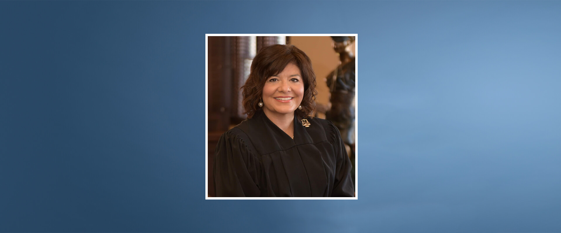 Banner with photo of the Hon. Lori Valenzuela in her black judge robe.