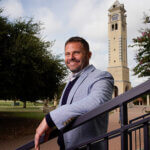 Jason King in front of the Bell Tower