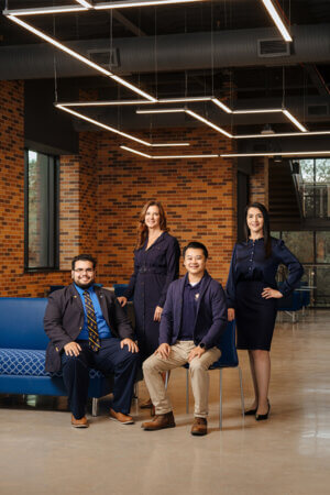 Francisco Garcia; Donna Badowski, D.N.P.; Kelvin Wu, Ph.D.; and Vanessa Peña, Ph.D. sit in the Blank Sheppard Innovation Center.