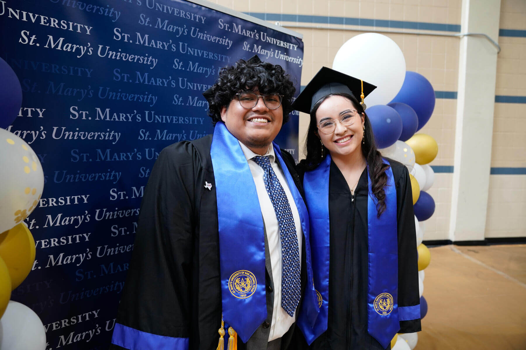 St. Mary's Graduation students posing together as they commemorate their graduation