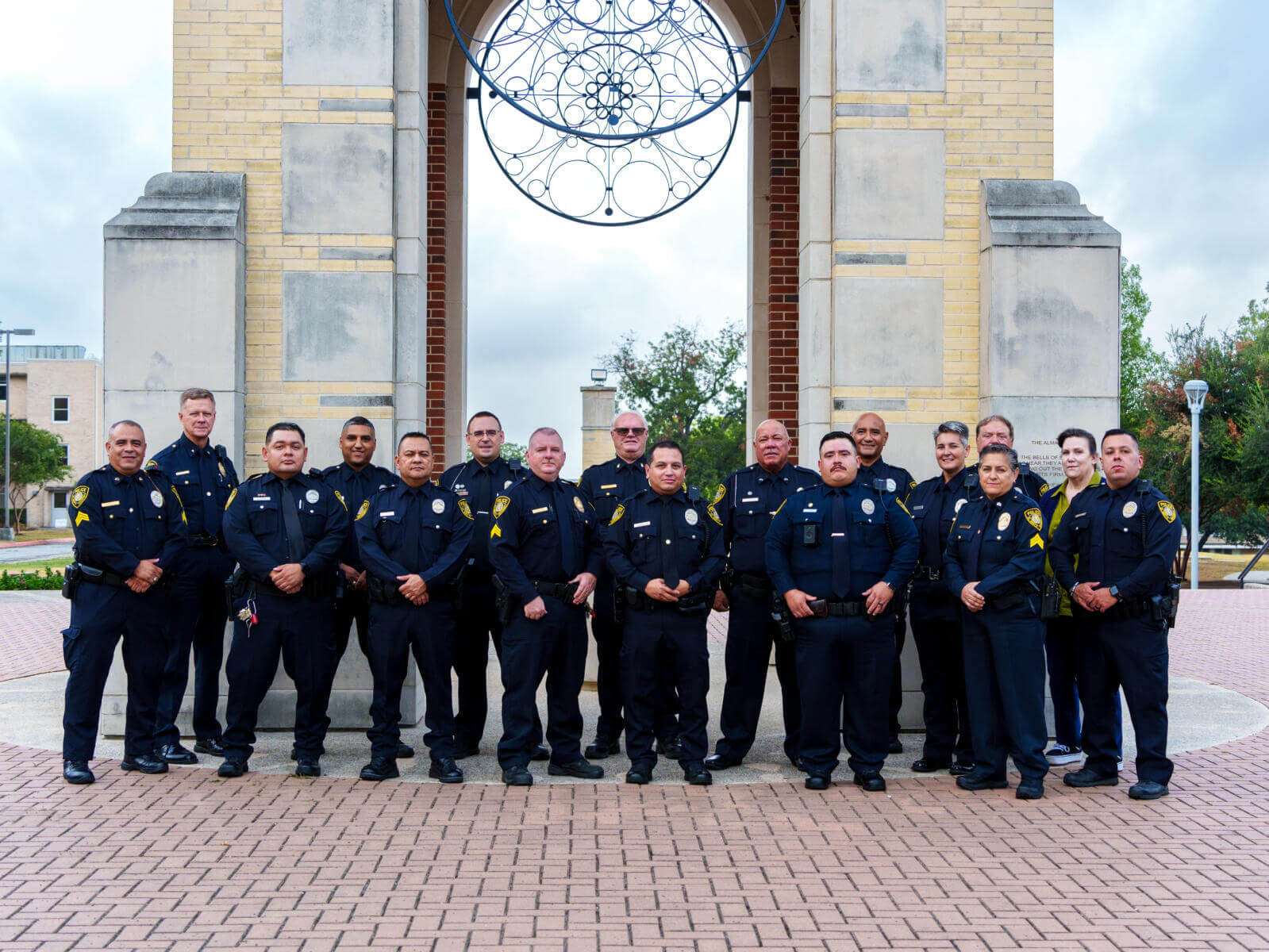 St. Mary's police take group photo at the Barrett Memorial Bell Tower