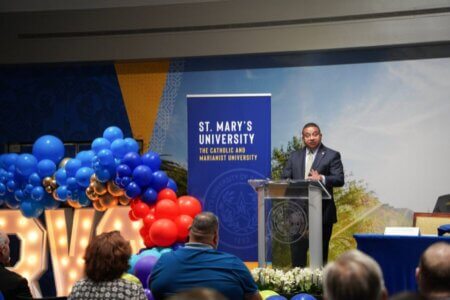 President Winston Erevelles speaks at the news conference announcing a new dual credit teacher expansion project with Alamo Colleges.