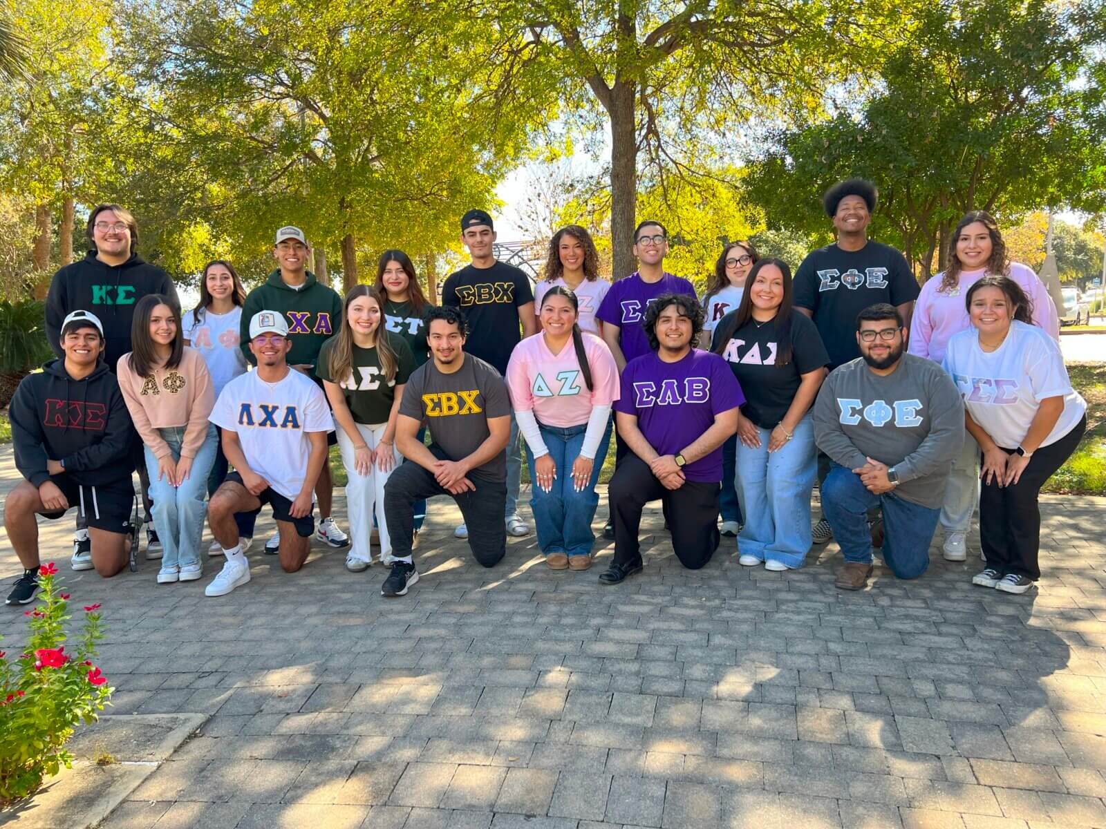 Fraternity and Sorority Students post for a group photo