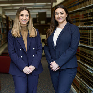Photo of Caroline Villarreal and Kendall Michaelis in the Sarita Kenedy East Law Library on the St. Mary's Law campus.