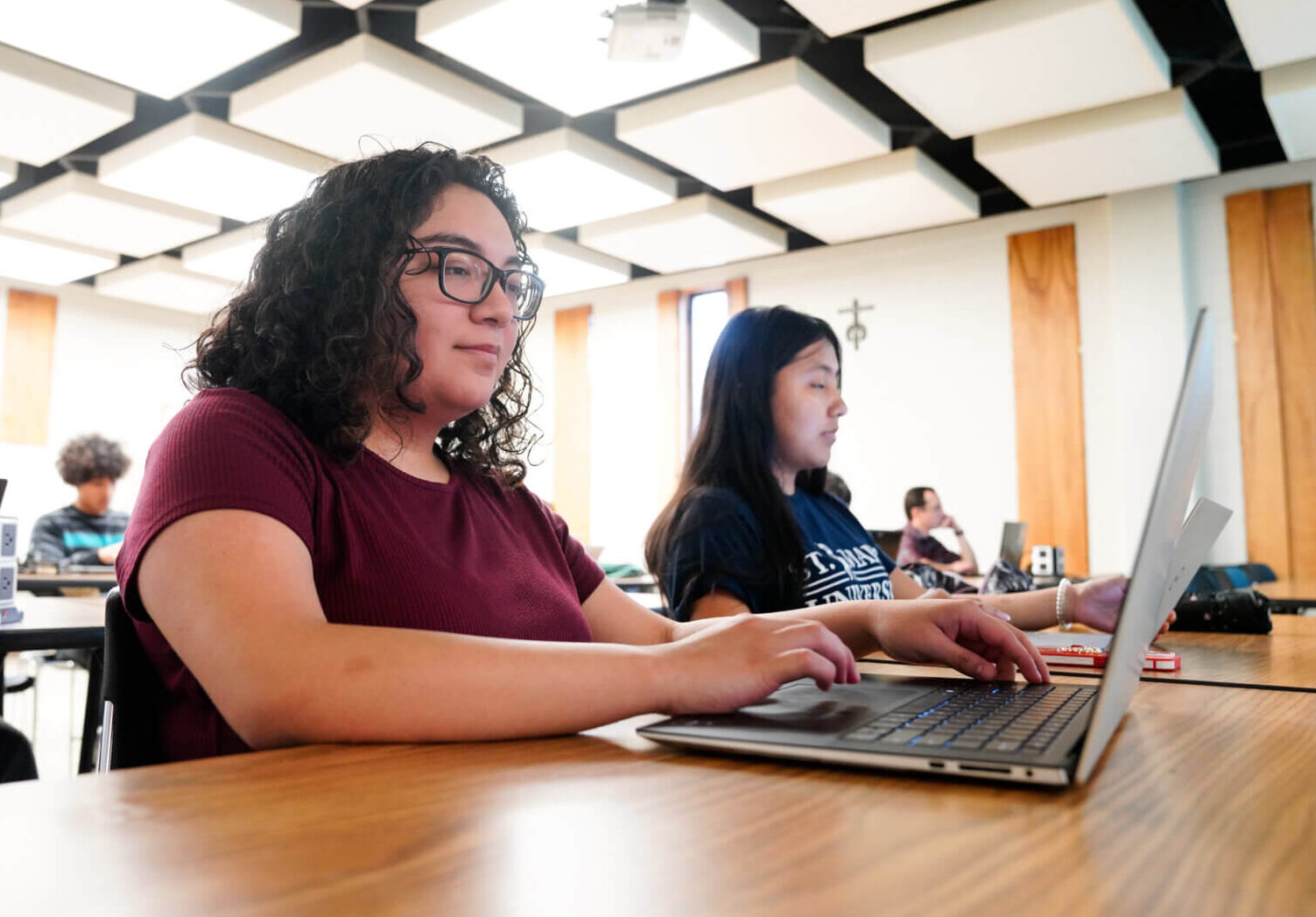 Two SET female students in class.