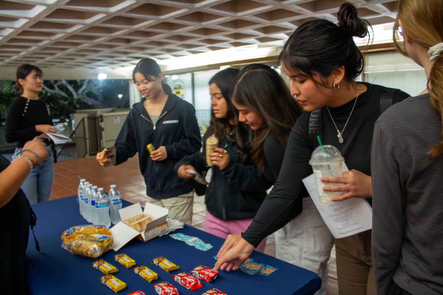 Students enjoy snacks from the Rattler Refuel table.