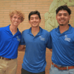 Three Marianist Leadership Program students attend Opening of School Liturgy in Fall 2025.