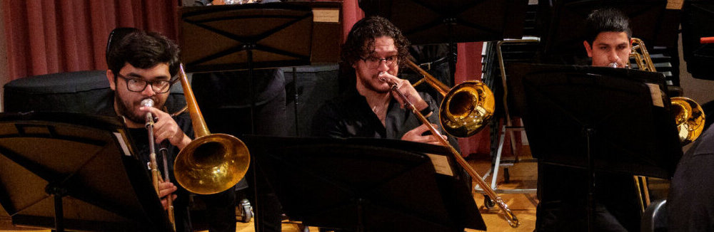 Music students playing the trombone.