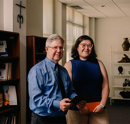 Bradford Whitener, Ph.D., and student Julia Camacho discuss her recent project.