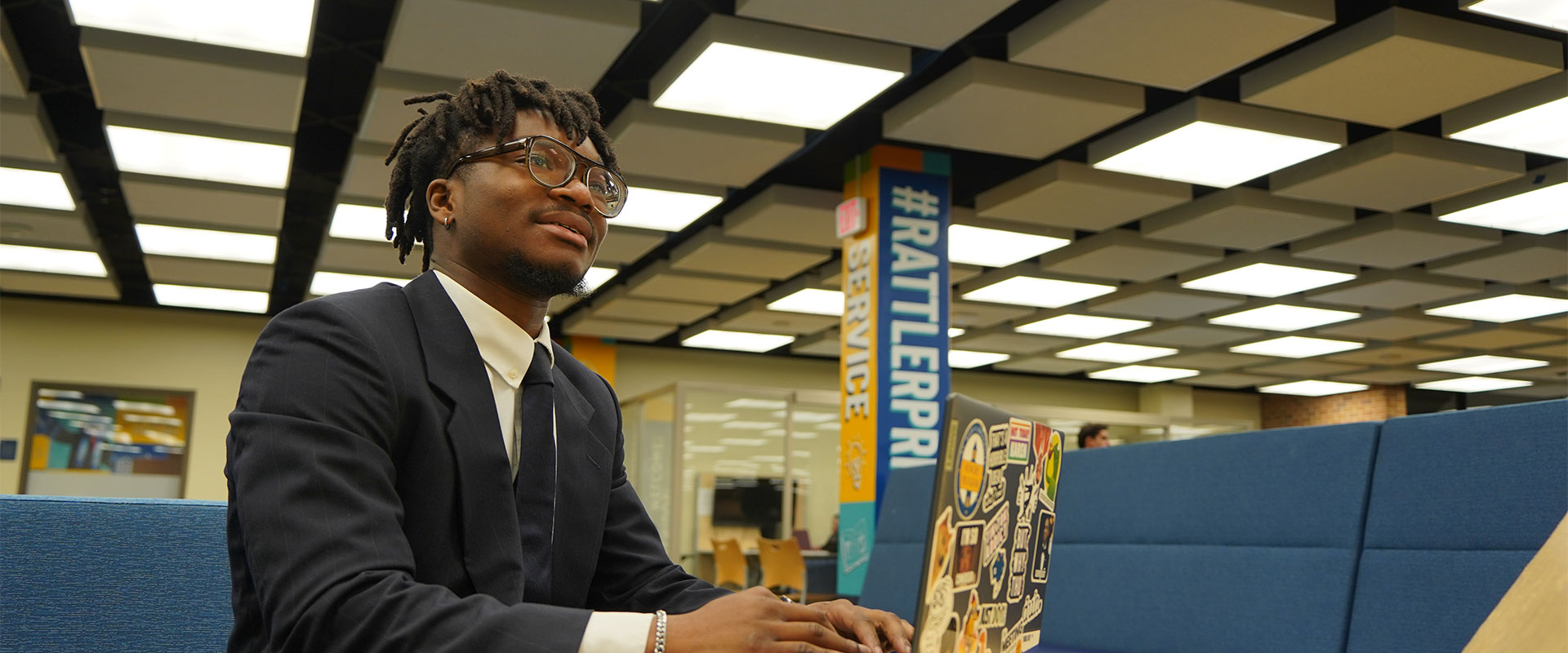 Nnamdi “Jesse” Onwuzurike uses his computer in the Commons