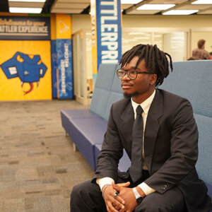 Nnamdi “Jesse” Onwuzurike takes a seat inside the Charles L. Cotrell Learing Commons.
