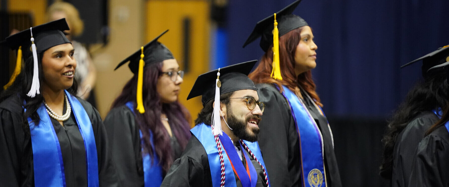 Graduates line up together during the commencement ceremony.