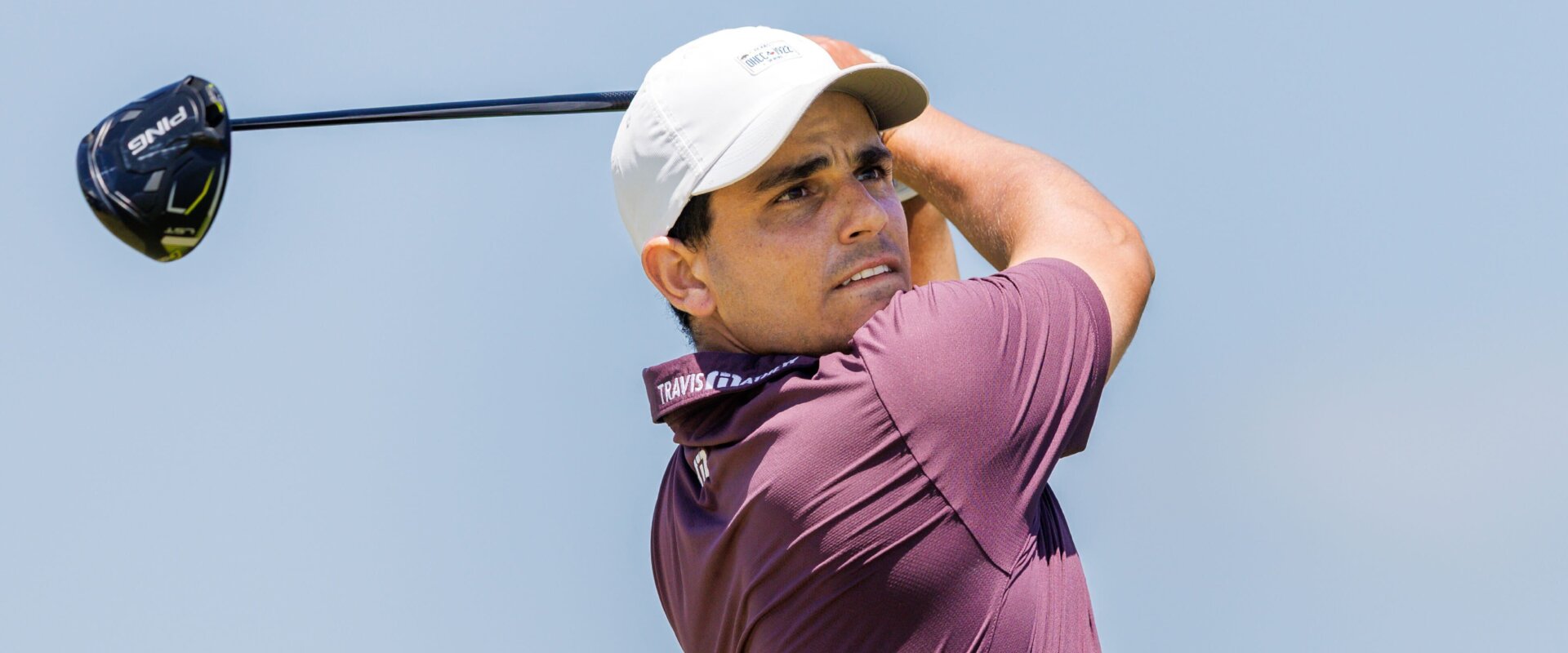 Emilio Gonzalez Ramirez tees off during a round of golf.