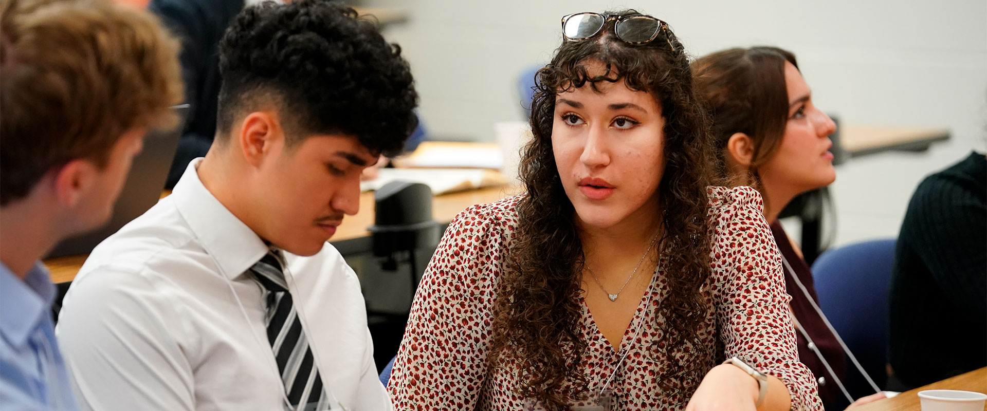 Emily Davey debates teammates during the 28th annual Texas Regional Bowl at St. Mary's University.