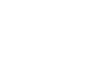 Graduation cap with a medal.