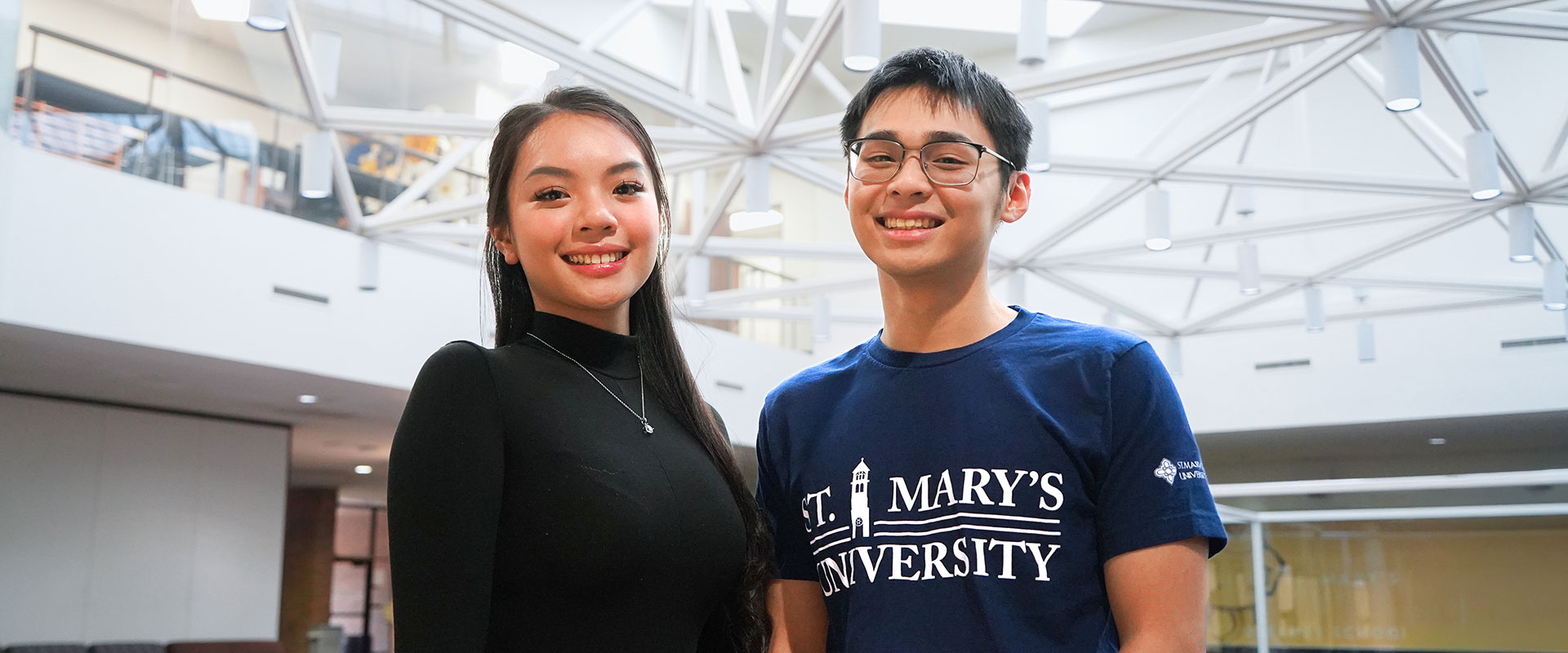 Nguyen Phuong Thao “Katie” Pham, left, and Tri Ma are two students from Vietnam who have taken different paths to get to St. Mary’s University's Greehey School of Business.