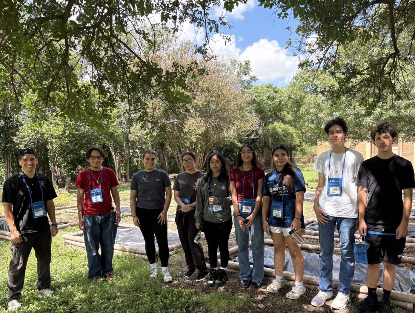Students in the Wayfinders program at St. Mary's University gather together surrounded by nature.