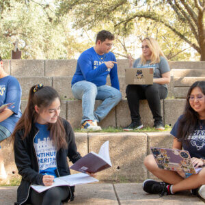 Students study and relax outside at the St. Mary's University amphitheater.