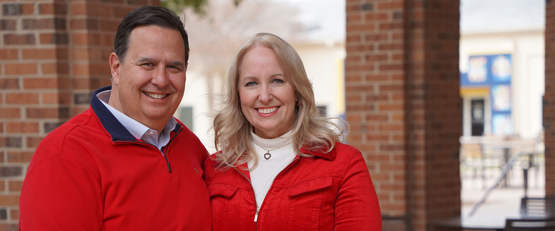 Javier and Suzanee Oliva seen by the Contreras Family Lounge.