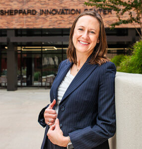 Jennifer LaFoy stands in front of the Blank Sheppard Innovation Center.