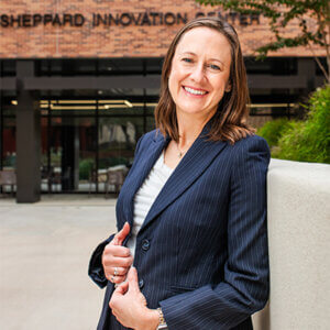 Jennifer LaFoy stands in front of the Blank Sheppard Innovation Center.