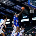 St. Mary's University Men's Basketball player Lawyer Jones makes a lay-up during the Lone Star Conference tournament quarterfinals.
