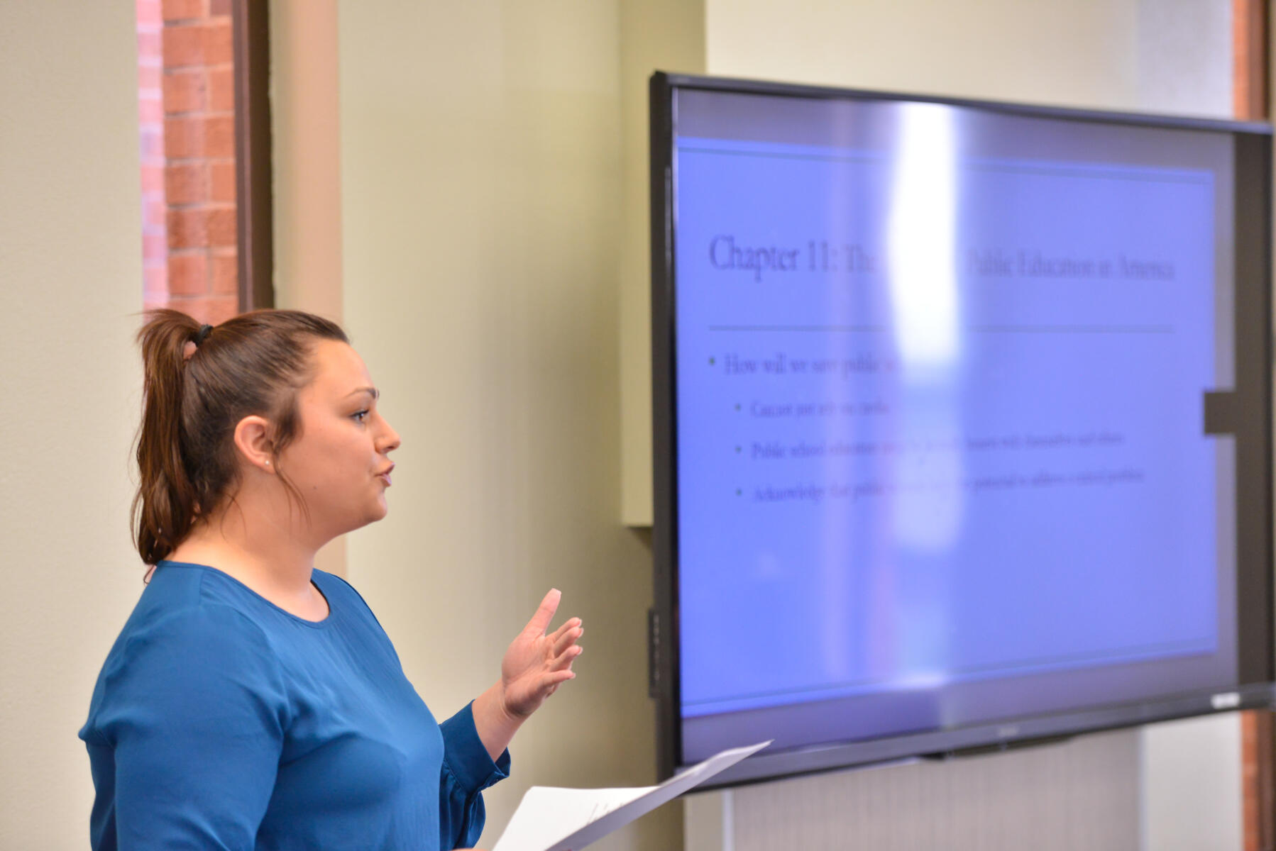 Female student presenting.