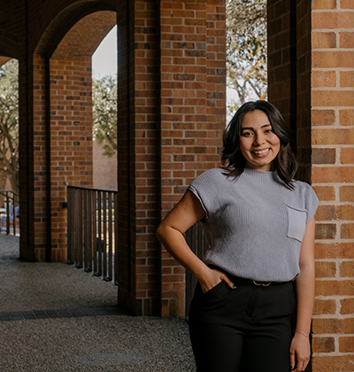 Melina Niño, J.D./M.P.H. student, is photographed on campus outside the Raba Law Building.