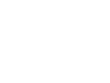An icon of people seated at a table talking. The person on the left has a speech bubble with a check mark in it.