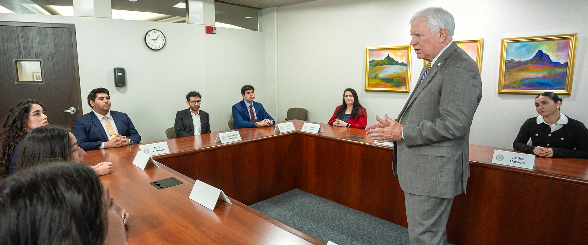 Paul Green stands in his class about the Texas Supreme Court.