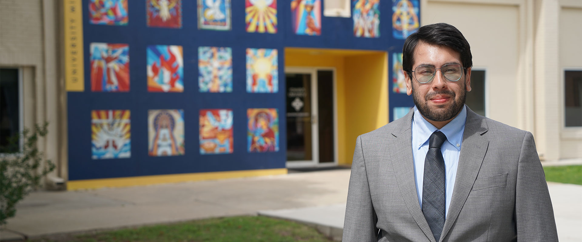 Eduardo Velazco stands outside the University Ministry building.