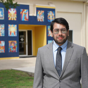 Eduardo Velazco stands outside the University Ministry building.