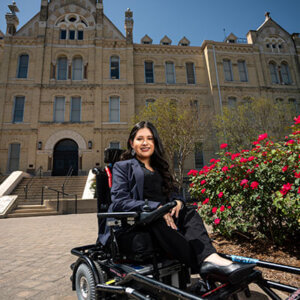 Political Science major Jado Cano outside St. Louis Hall on the ������Ƶ's University campus.