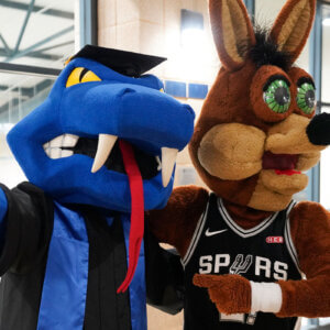 Rattler Man and the Spurs Coyote have an epic team-up during the Law Commencement in May 2025