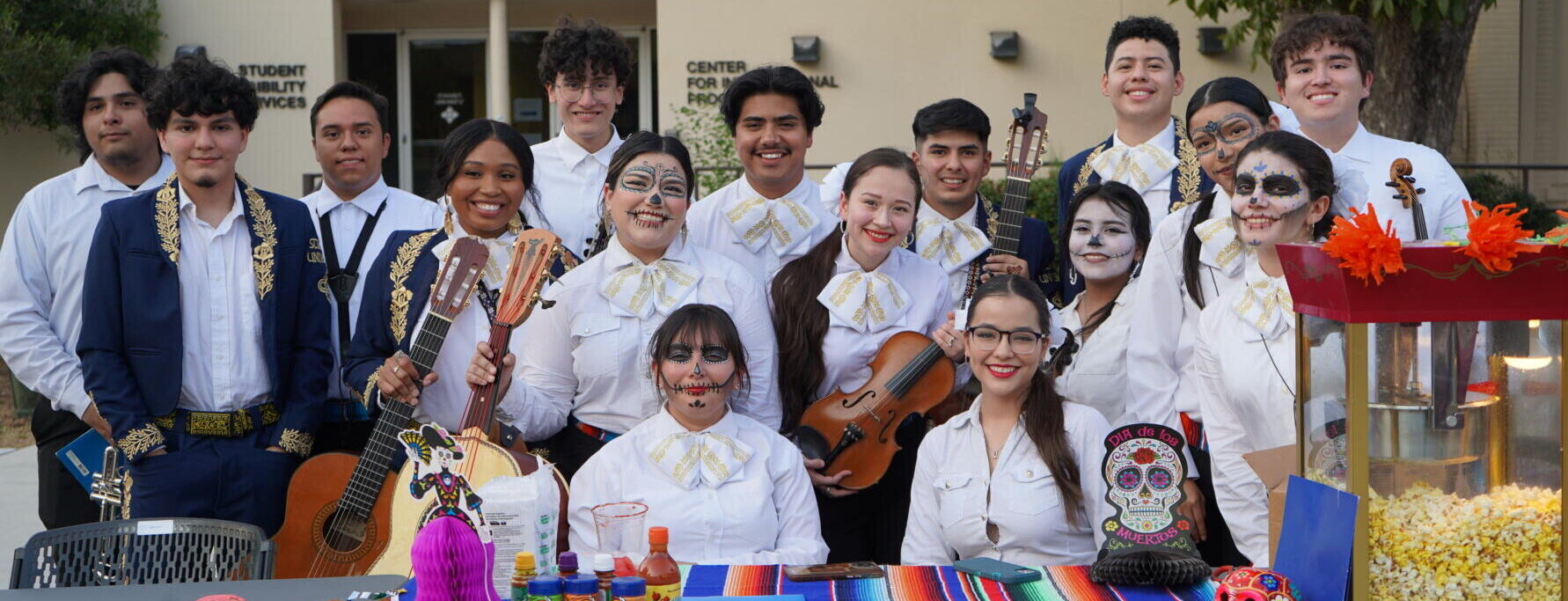Students gather together and celebrate the Day of the Dead.