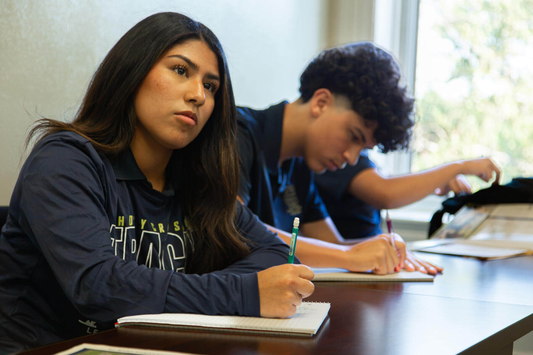 Holy Cross high school students in a St. Mary's University Classroom.