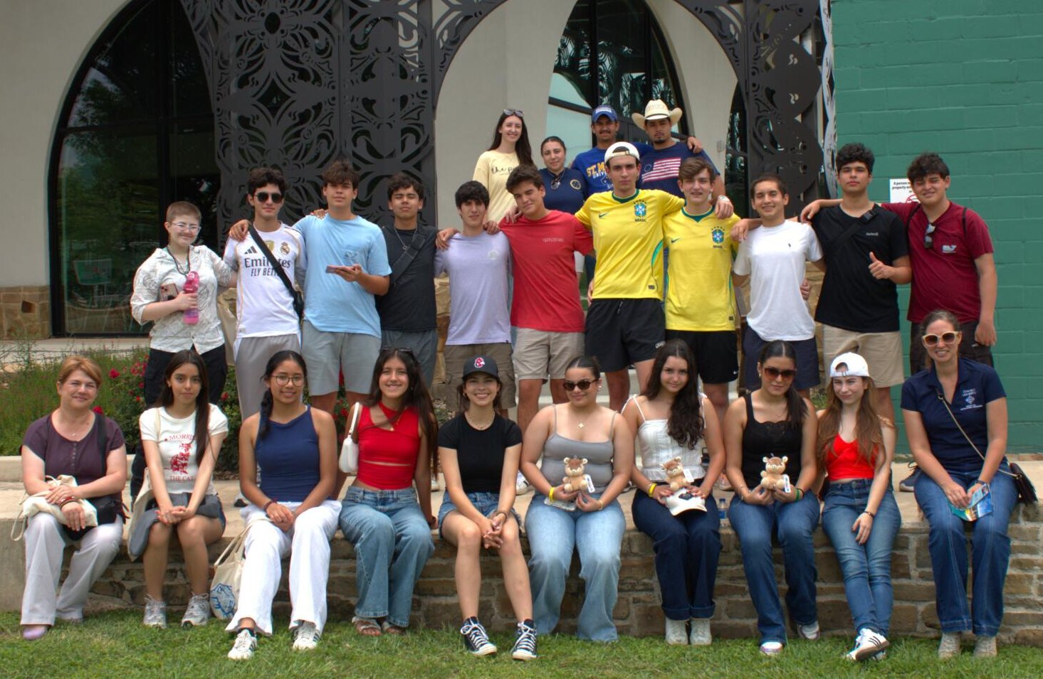 Students take a group photo abroad.