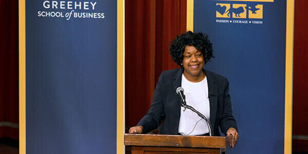 Paula Gold-Williams speaking at Forum Breakfast at the Pearll