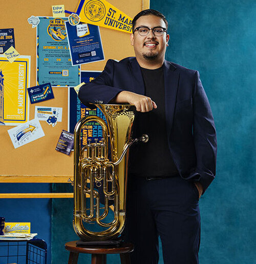 Student with a musical instrument.